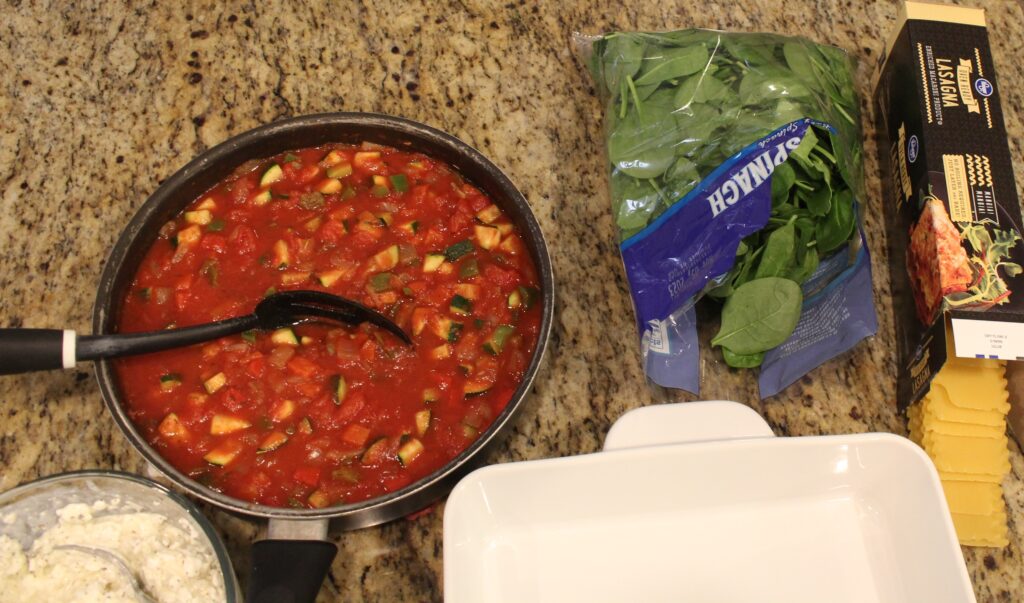 Layers of Veggie lovers lasagna ready to be put together.