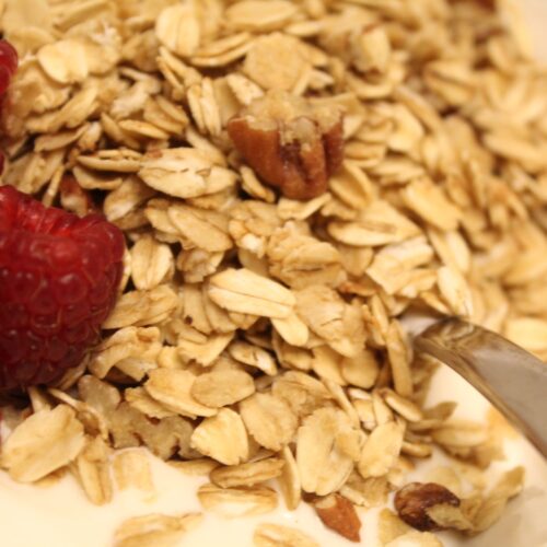 Granola on yogurt with raspberries