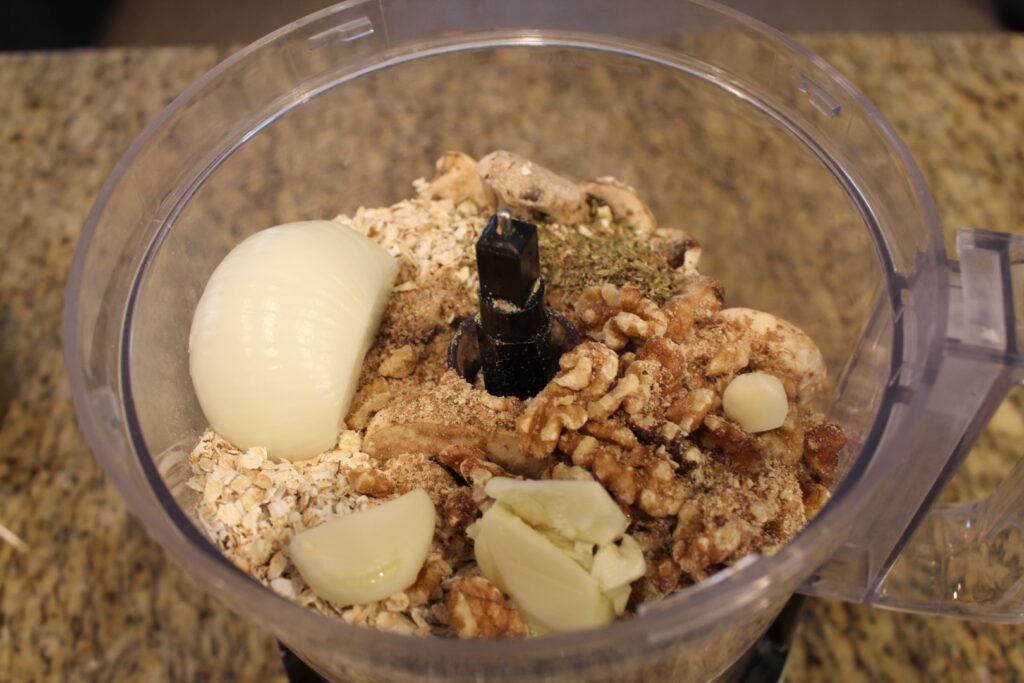 Mushroom meatball Ingredients in a food processor.