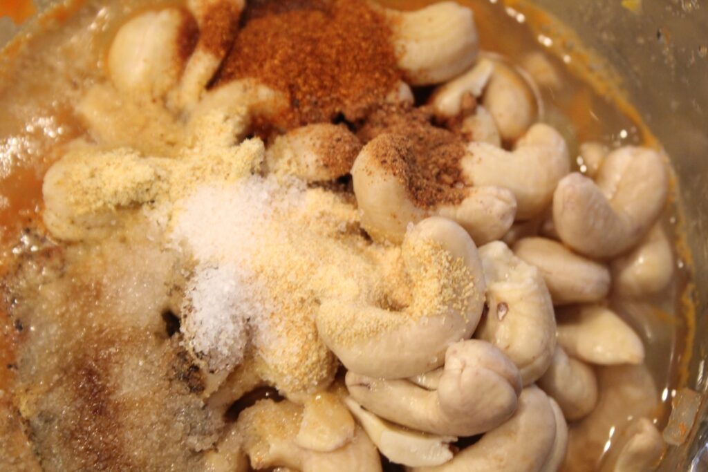 Cashews and seasonings in a blender.