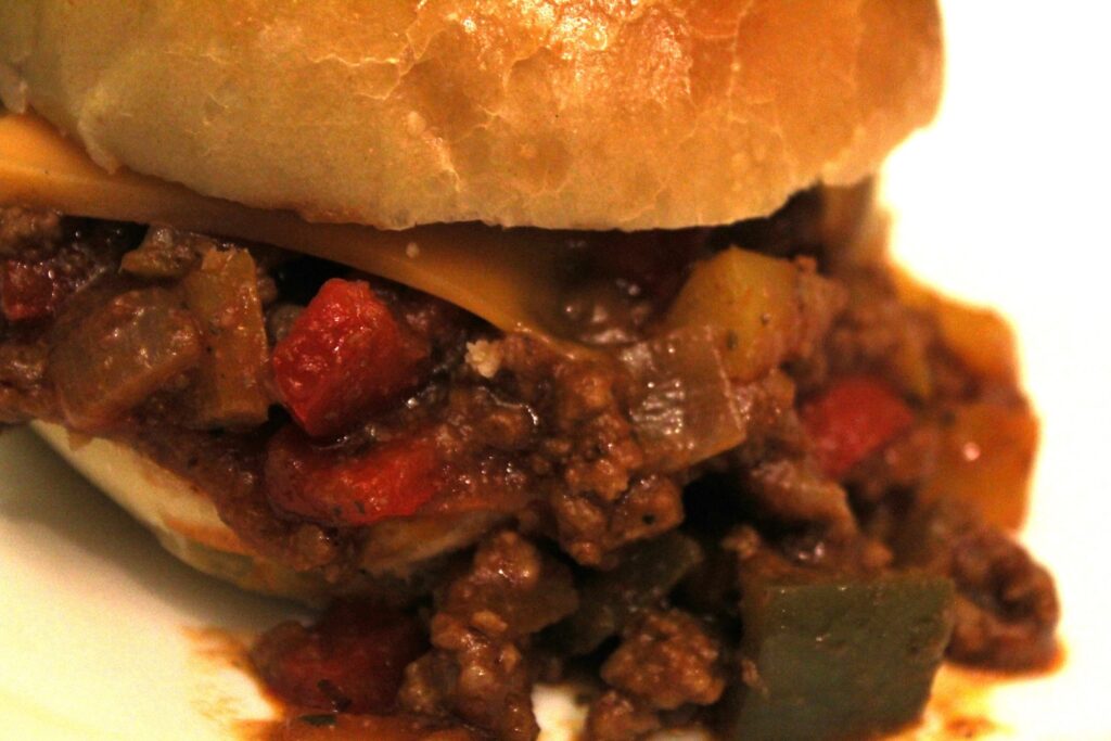 Close up of veggie balsamic sloppy joe filling in a bun.