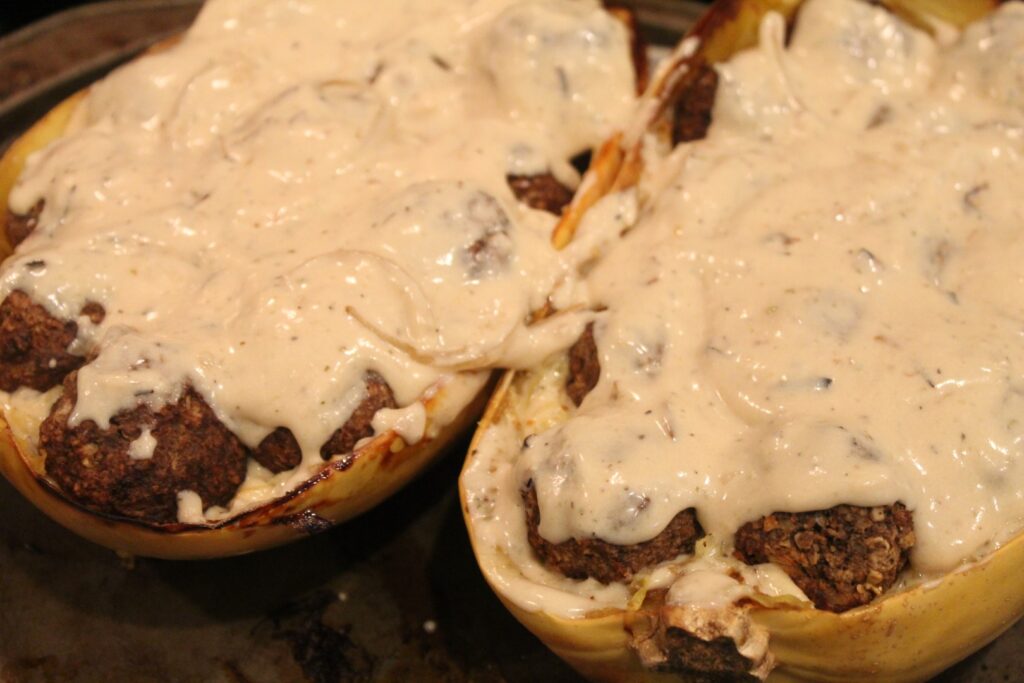 Mushroom meatballs in a spaghetti squash topped with stroganoff sauce.