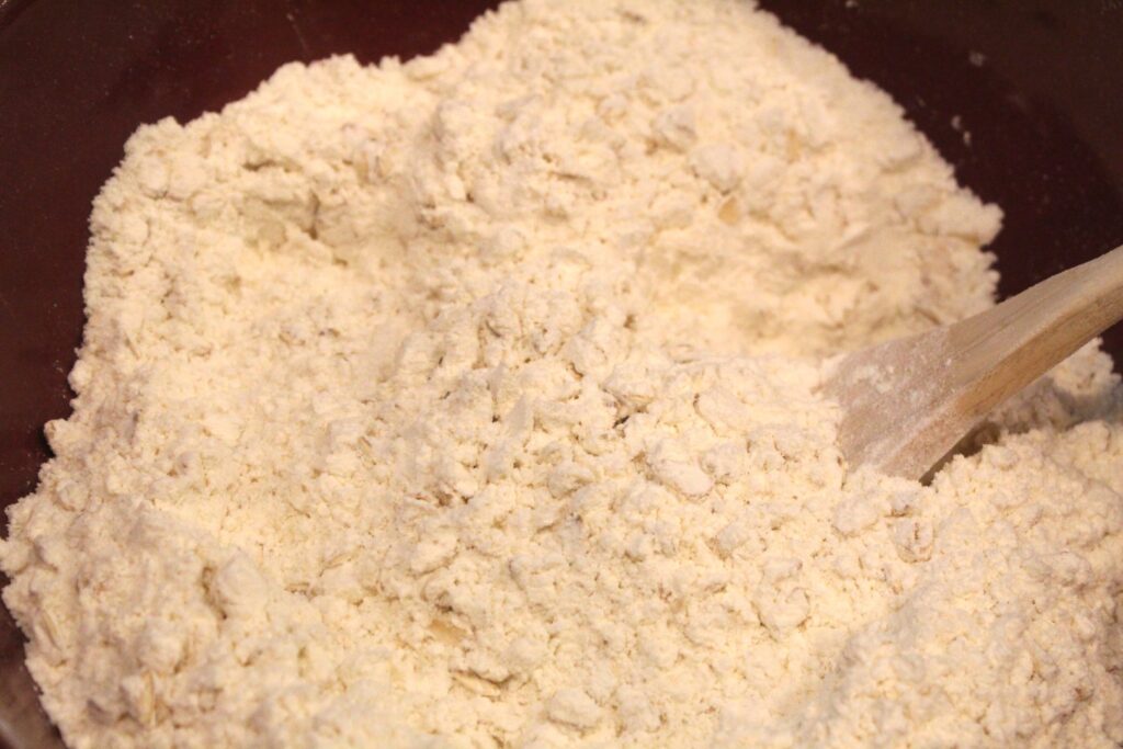 Flour and oats mixed in a bowl.