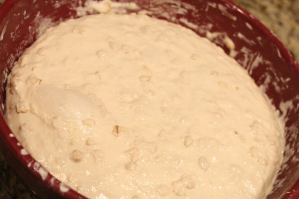 Risen sourdough honey oat dough.