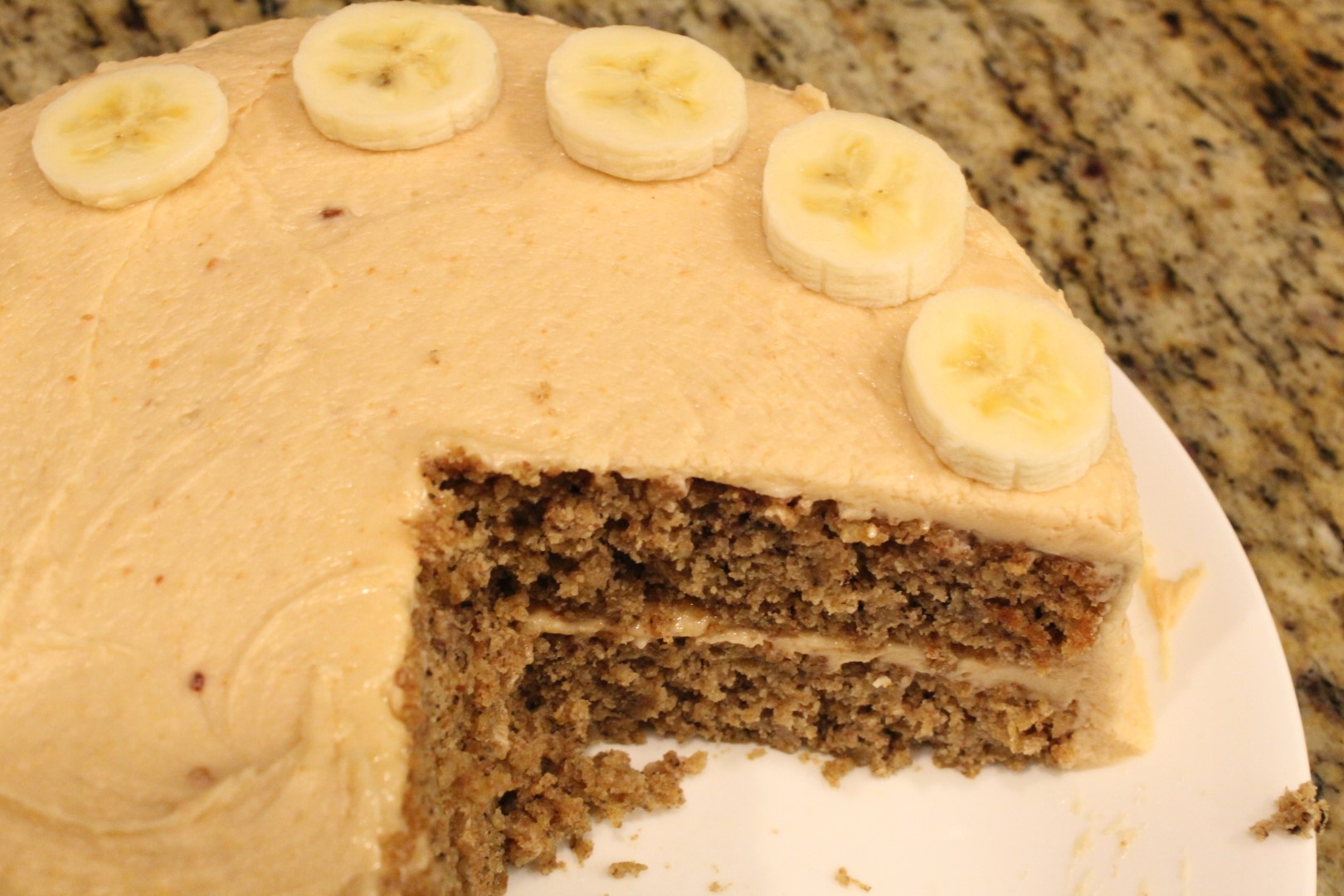 Whole Grain Banana Oat Cake with Peanut Butter Frosting