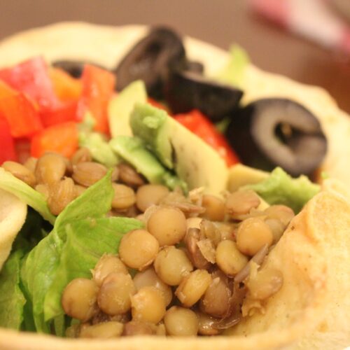 Lentil Taco salad bowl made from a toasted tortilla.