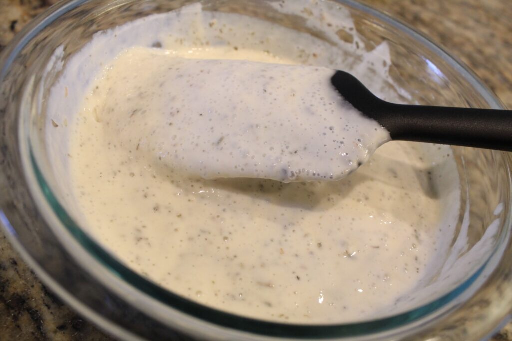 Sourdough discard mixed with dried herbs