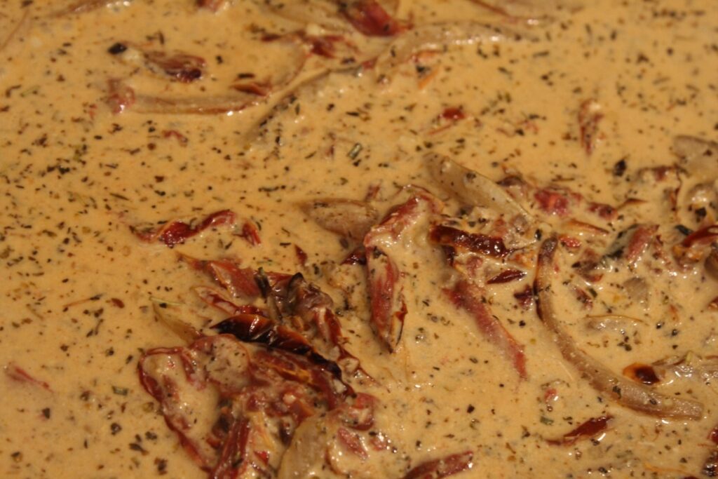 Dried tomato cream sauce.