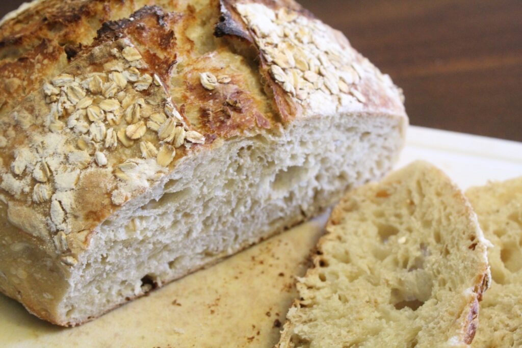 Sourdough honey oat artisan bread sliced.