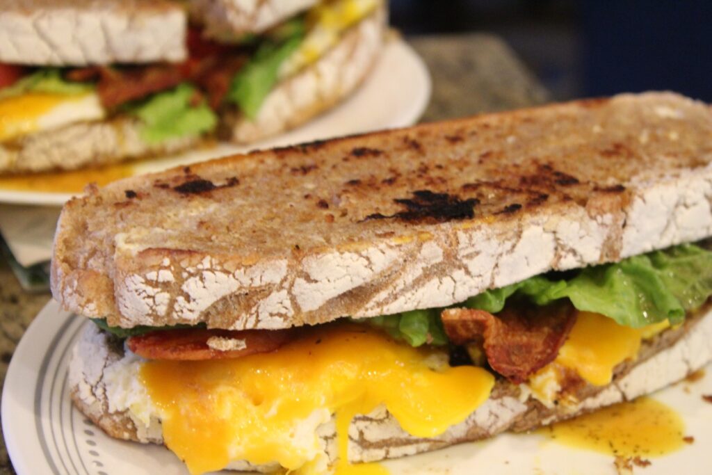 Veggie topped breakfast sandwich.