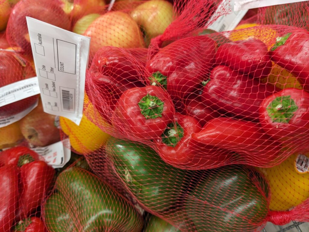 Bags of produce on sale.