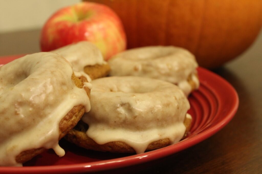 Pumpkin applesauce doughnuts with applesauce glaze.