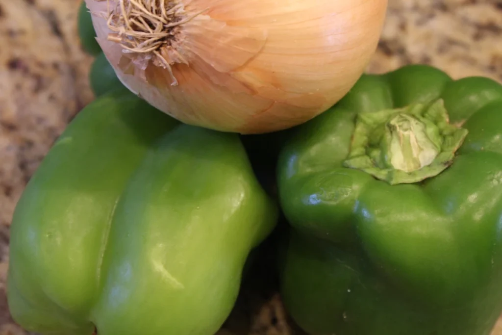 Onion and green bell peppers.