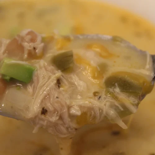 Spoon of white chicken chili