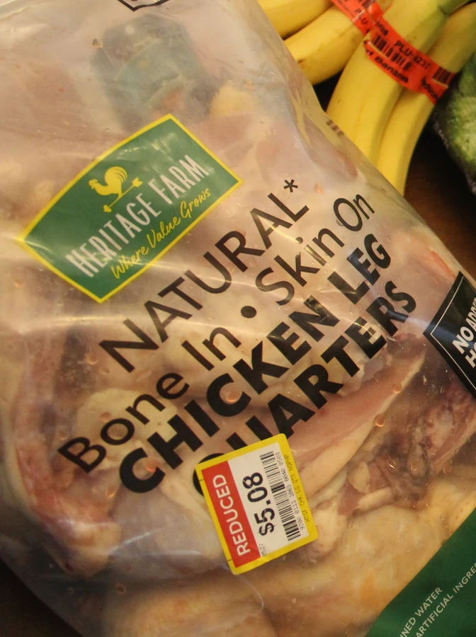 clearance priced bag of chicken leg quarters.