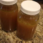 Glass jars filled with home made bone broth