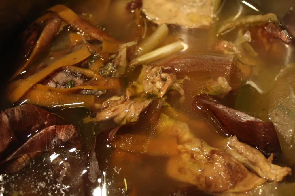 Vegetable scraps in bone broth.